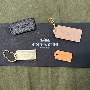 Bundle of 4 coach tags